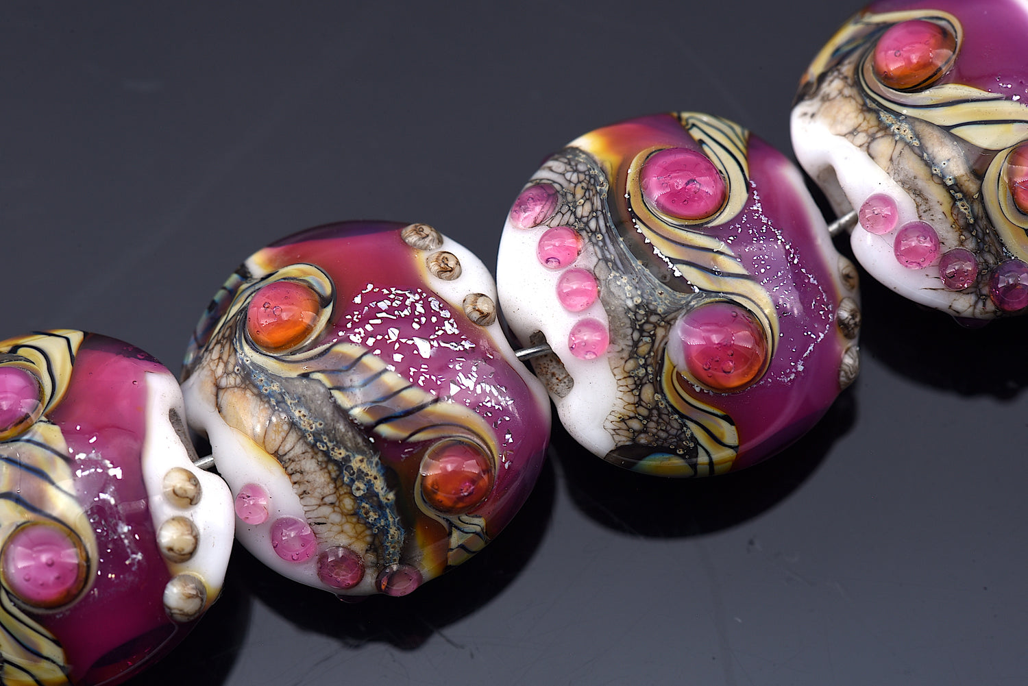 10109012 - Four Cranberry Stardust Lentil Beads