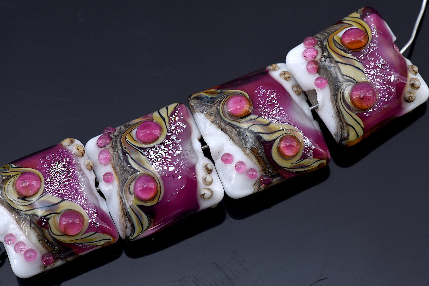 10109014 - Four Cranberry Stardust Pillow Beads