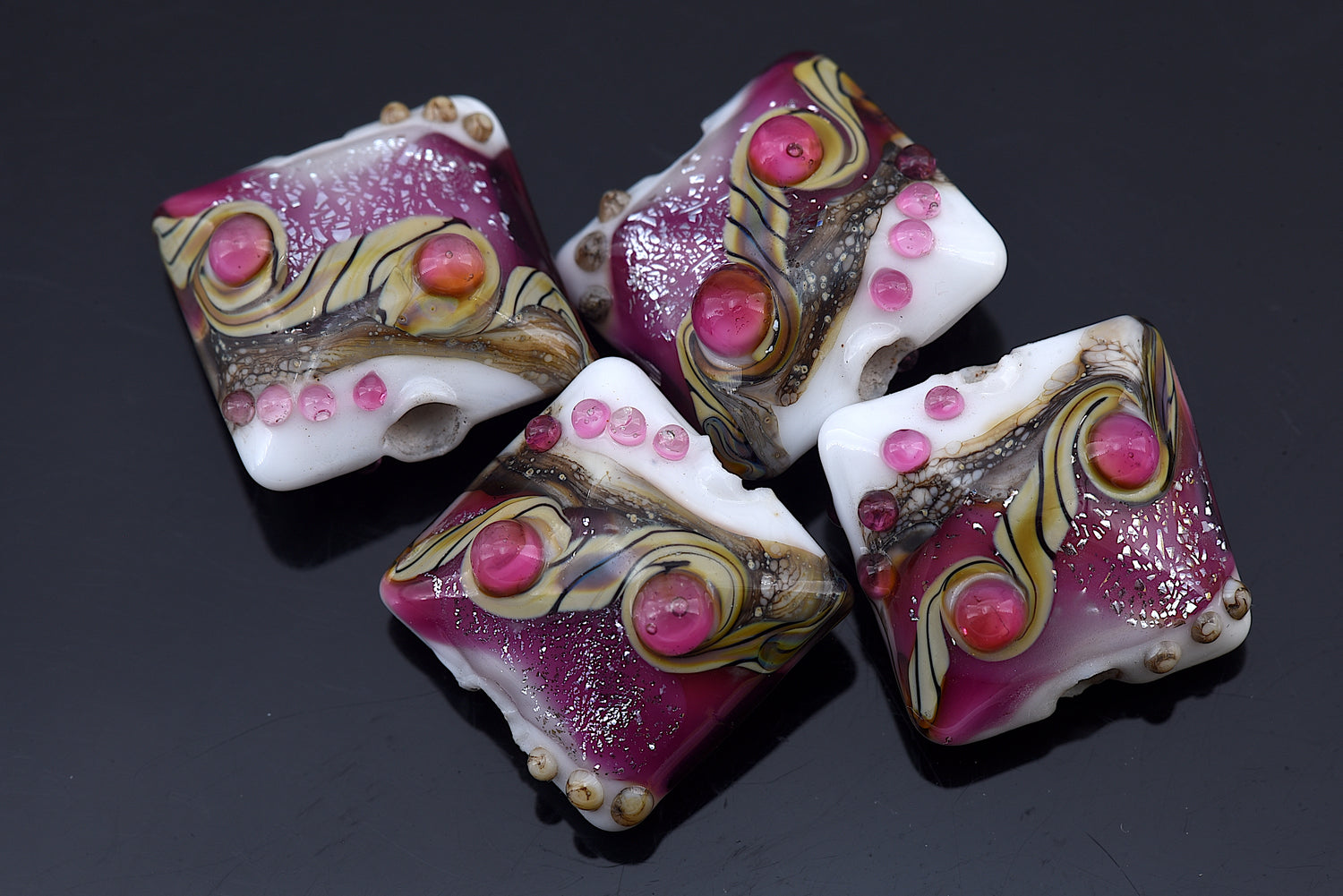 10109014 - Four Cranberry Stardust Pillow Beads