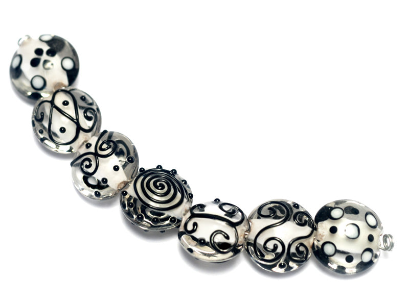 10202302 - Seven Black & White Lentil Beads