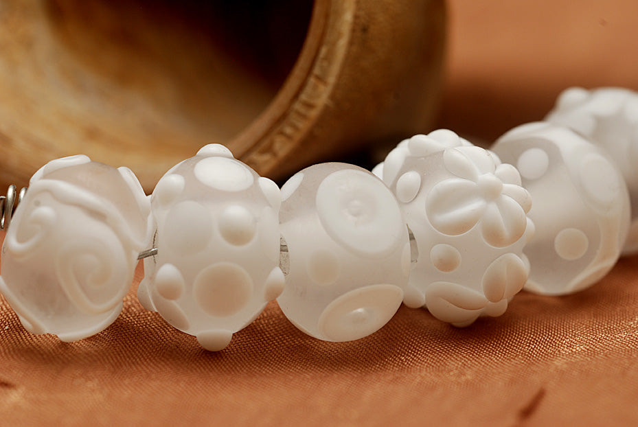 10204001 - Seven Matte Finish White Rondelle Beads