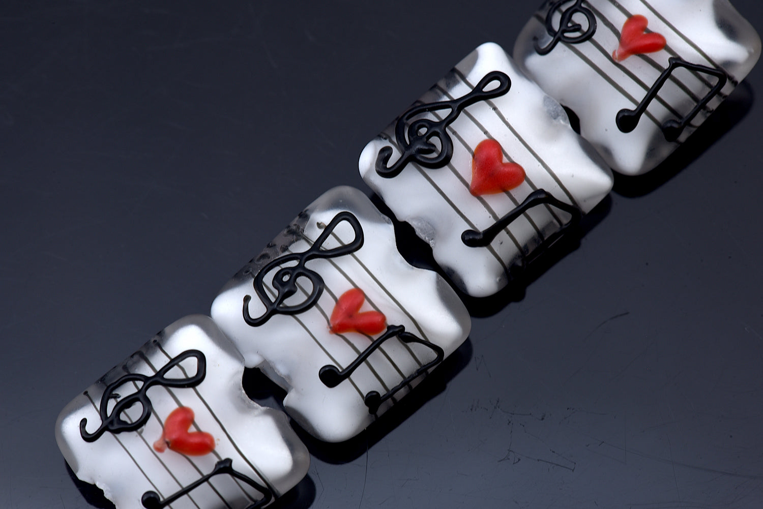 10205614 - Four Musical Love Notes Pillow Beads
