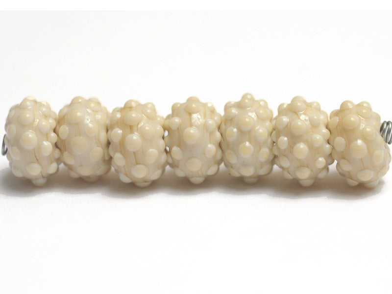 10306101 - Seven Cream Rondelle Beads
