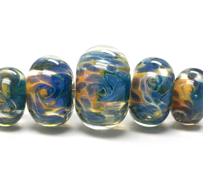 10409311 - Five Graduated Blue & Orange Rondelle Beads