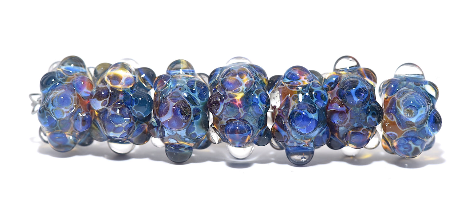 10409401 - Seven Blue & Orange Boro Rondelle Beads