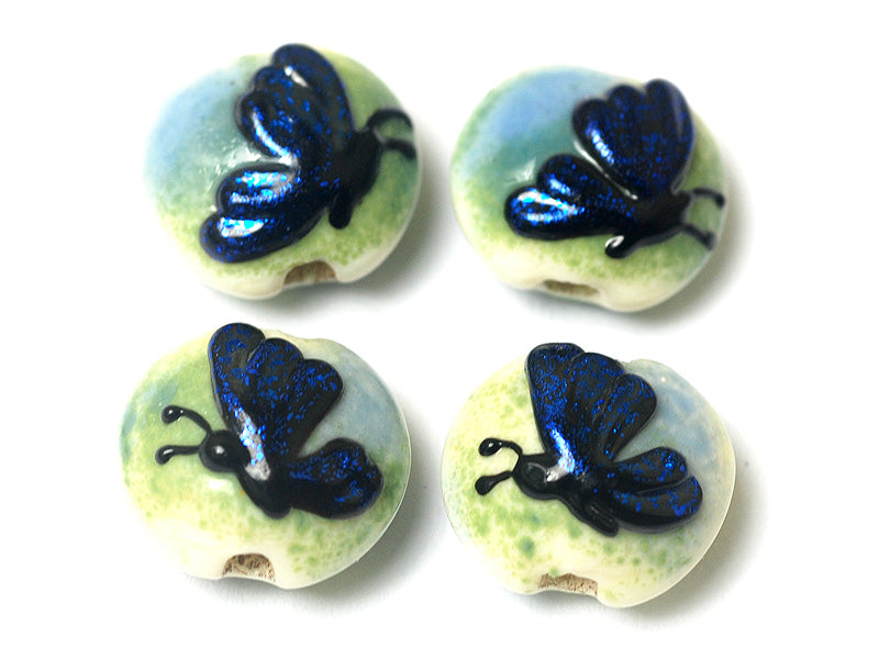 10412912 - Four Blue Sparkle Garden Butterfly Lentil Beads