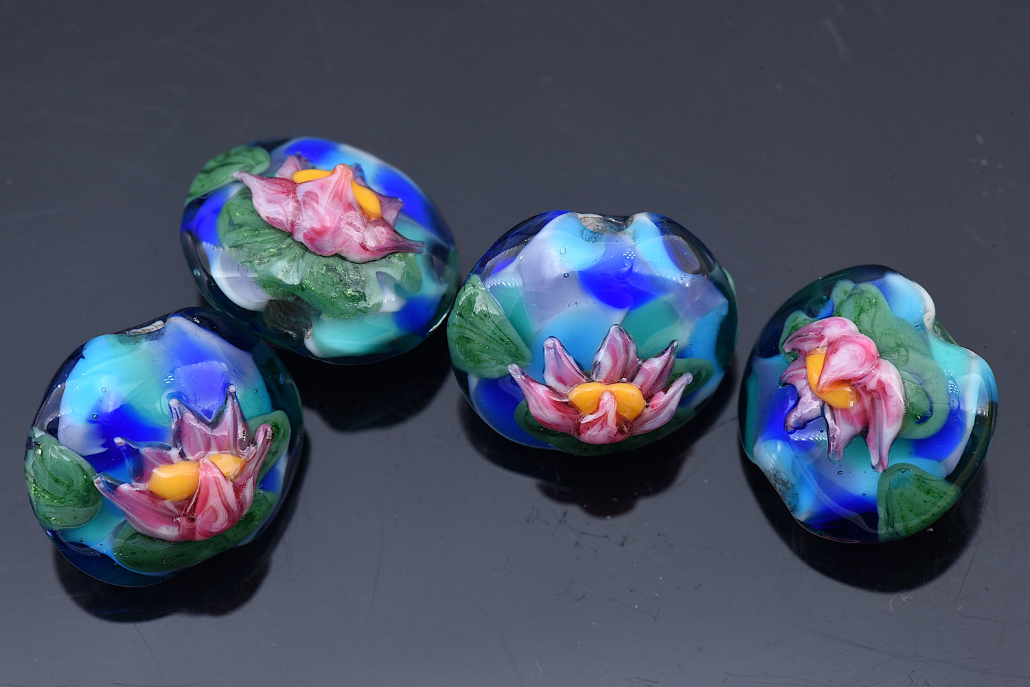 10415512 - Four Water Lily Pond Lentil Beads