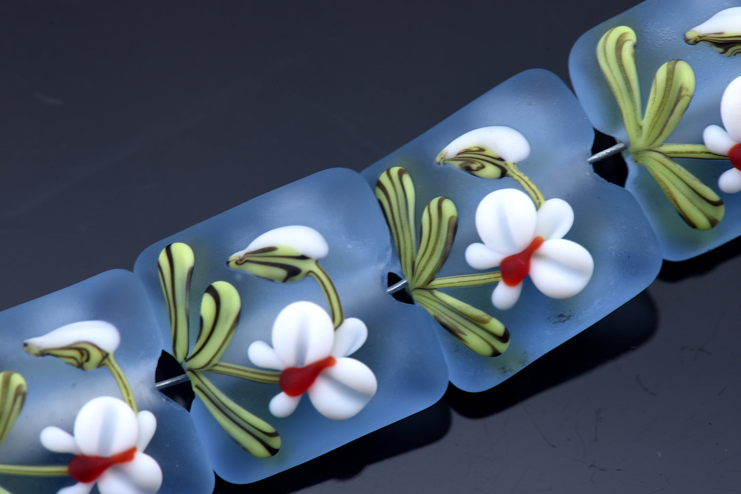 10415714 - Four White Orchid Pillow Beads