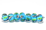10416401 – Seven Java Moss Pond Rondelle Beads