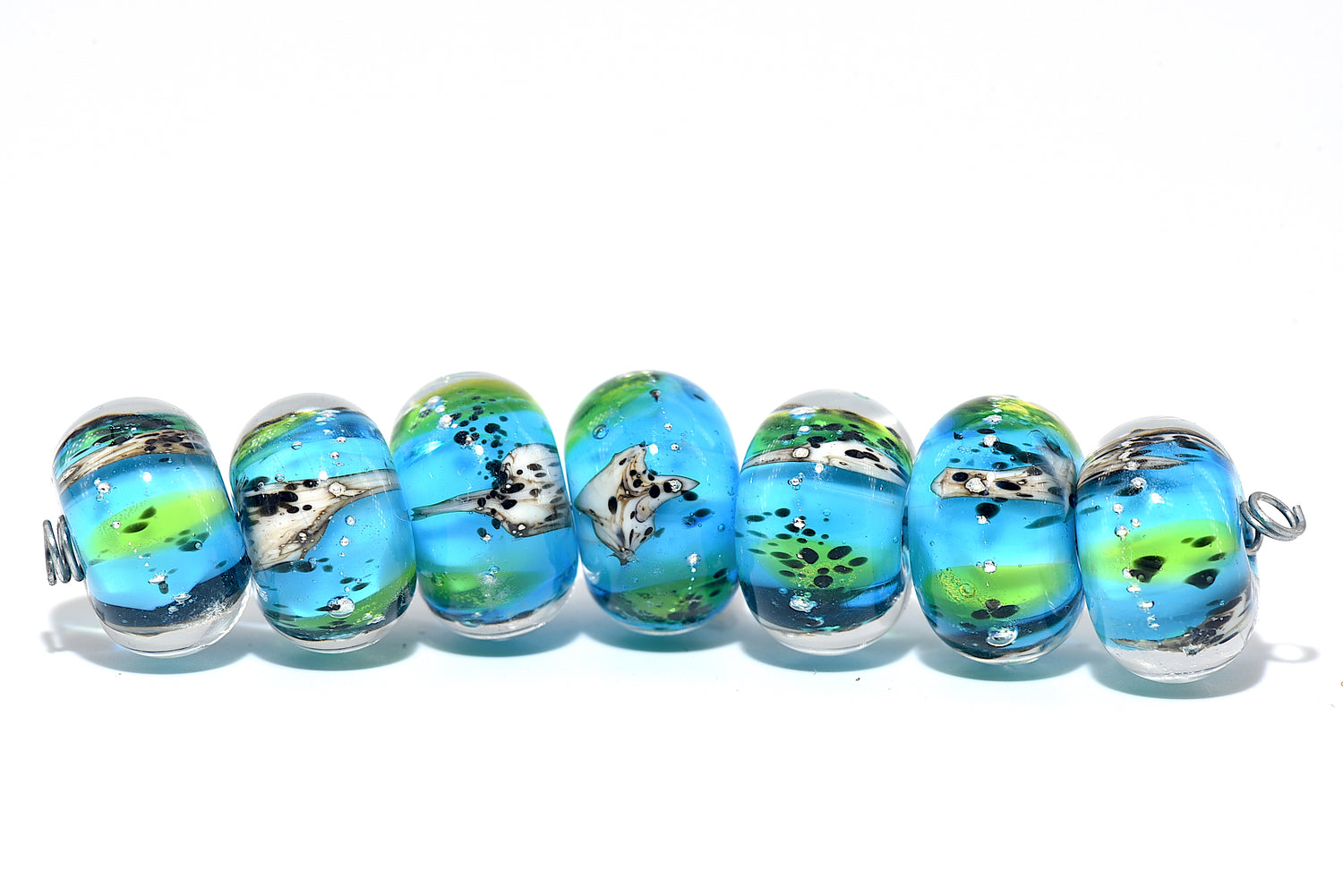 10416401 – Seven Java Moss Pond Rondelle Beads