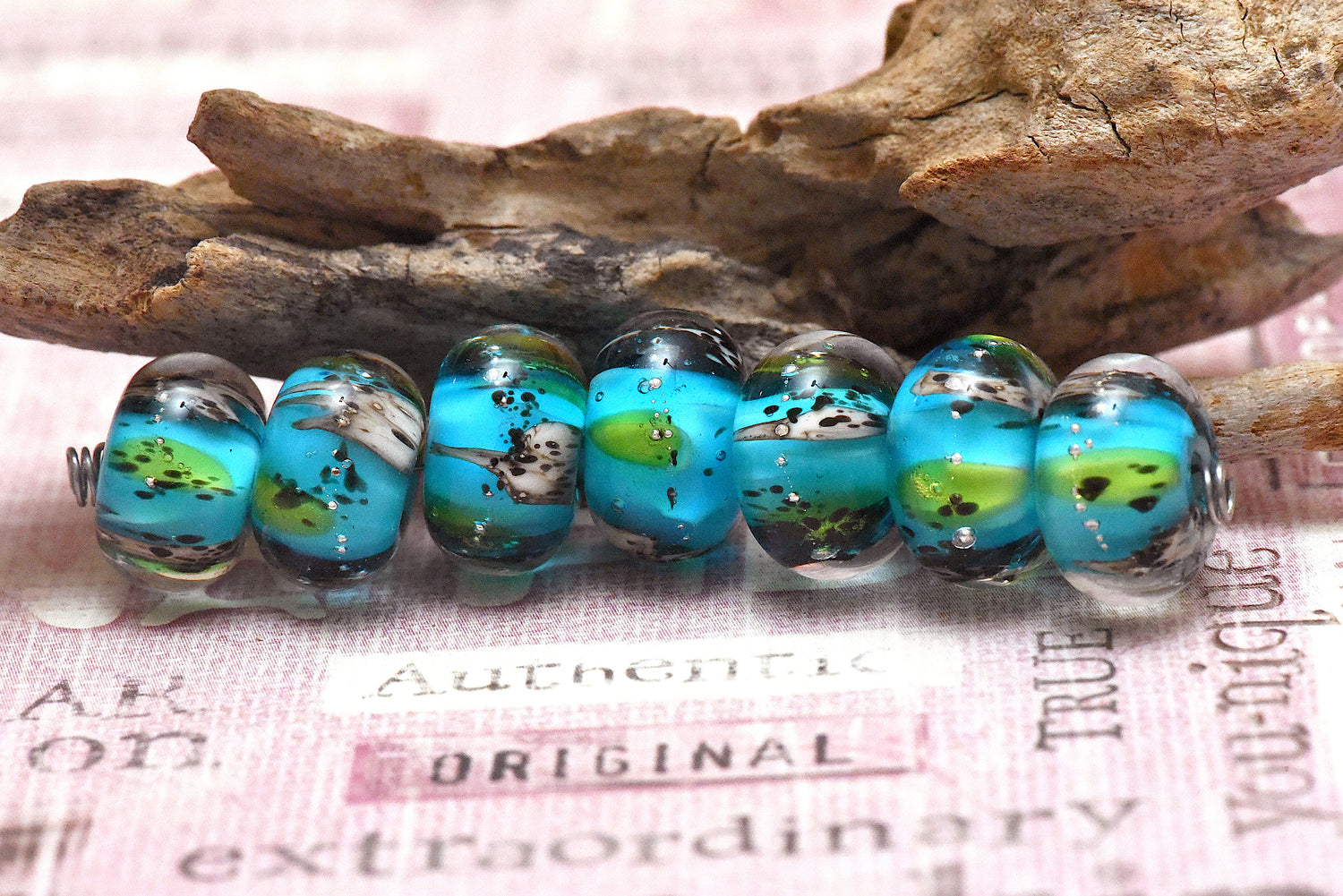 10416401 – Seven Java Moss Pond Rondelle Beads