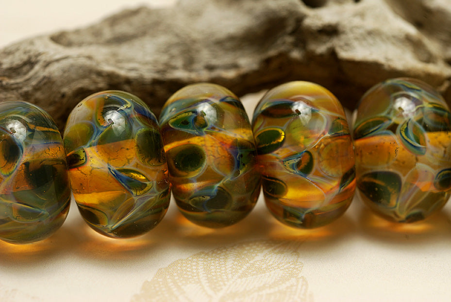 10504701 - Seven Green & Orange Rondelle Beads