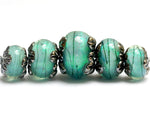 10507811 - Five Seafoam Shimmer Graduated Rondelle Beads