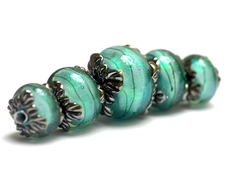 10507811 - Five Seafoam Shimmer Graduated Rondelle Beads