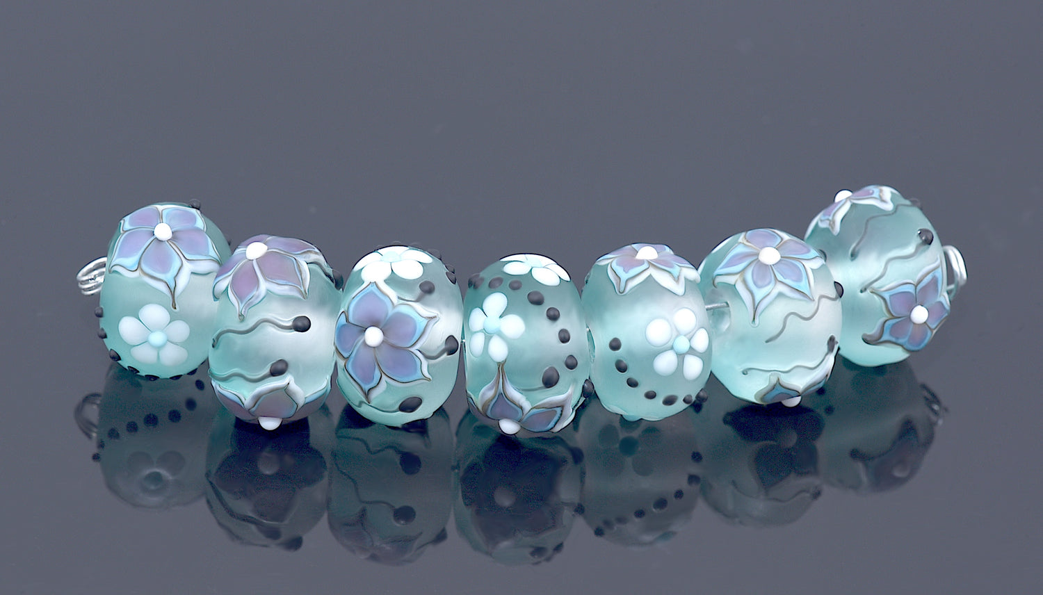 10509601 -Seven Morning Dew Teal Rondelle Beads