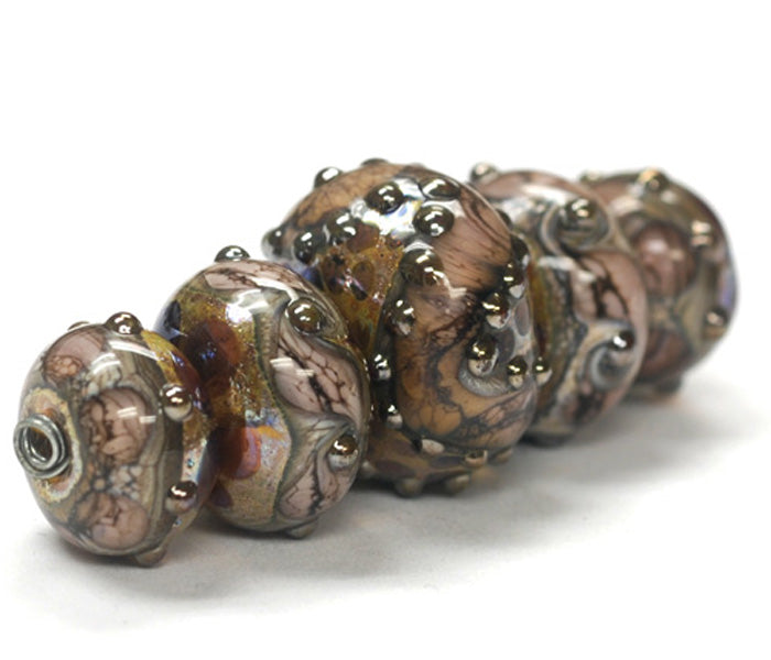 10601211- Five Graduated Dark Amethyst w/Silver Foil Beads