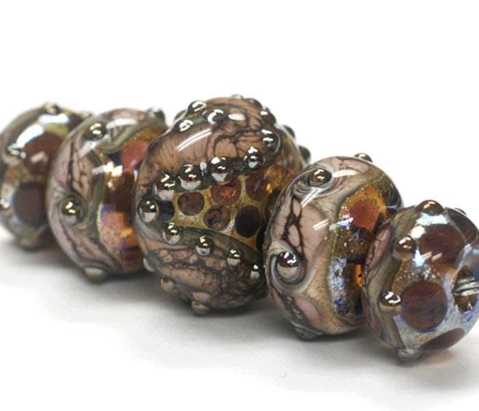 10601211- Five Graduated Dark Amethyst w/Silver Foil Beads