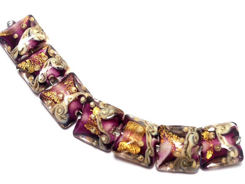 10602904 - Seven Amethyst Treasure Pillow Beads