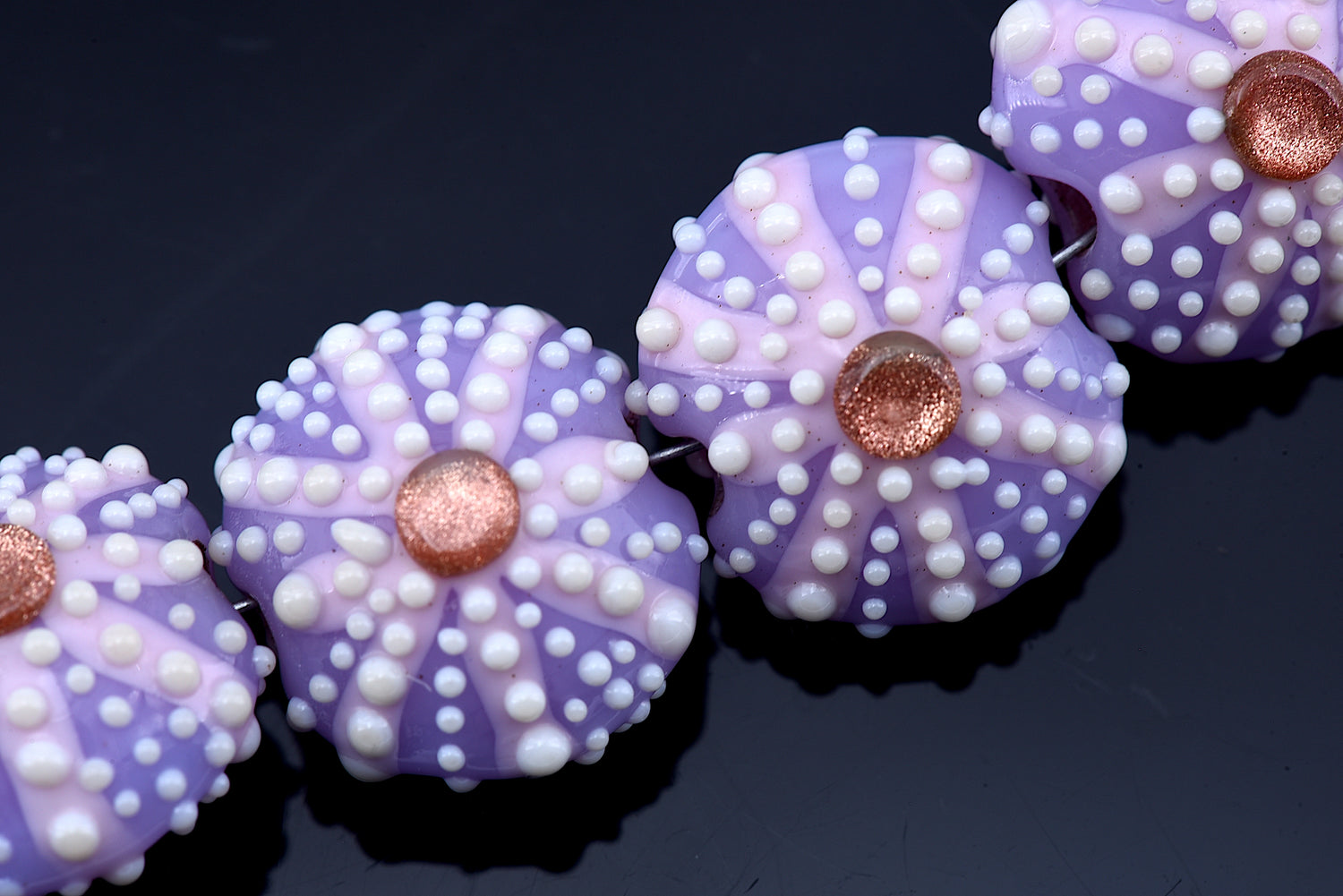 10605812 - Four Purple Sea Urchin Lentil Beads
