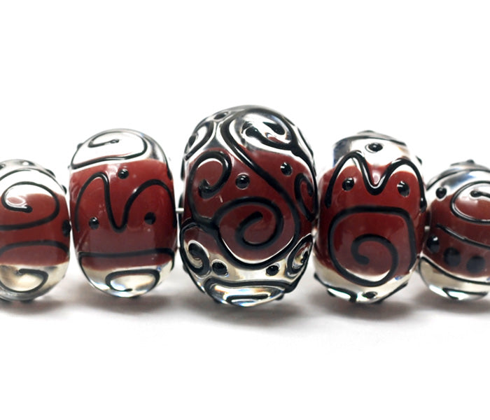 10702711 - Five Graduated Red Core w/Black Strips Rondelle Beads
