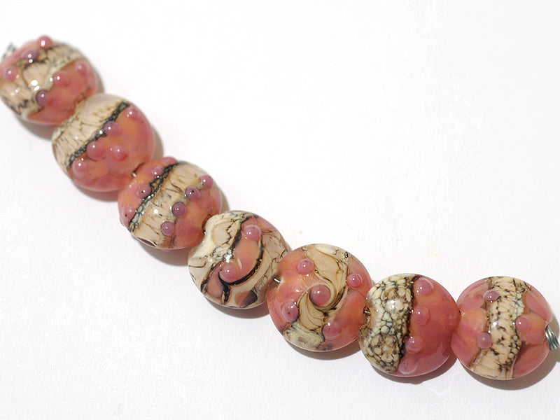 10704302 - Seven Pink/Soft Orange Lentil Beads