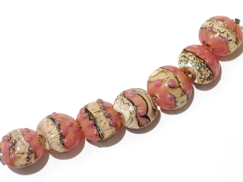 10704302 - Seven Pink/Soft Orange Lentil Beads