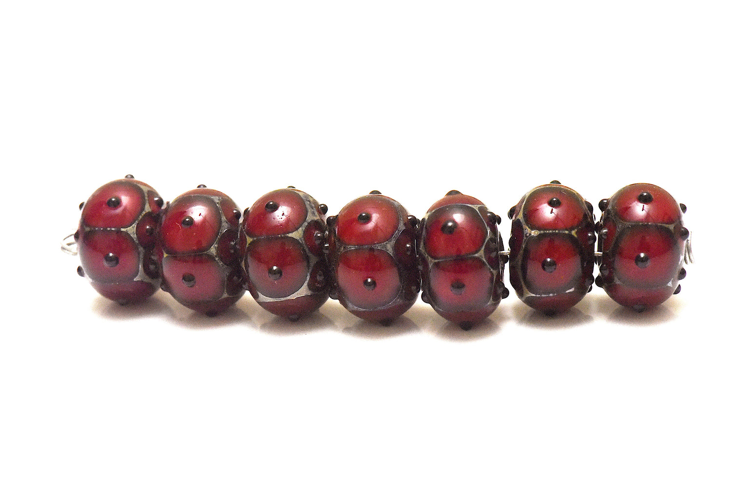 10704421 - Seven Red Rondelle Beads