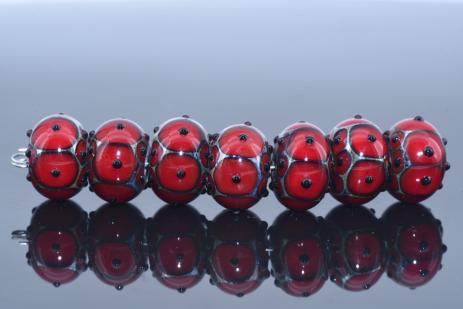 10704421 - Seven Red Rondelle Beads