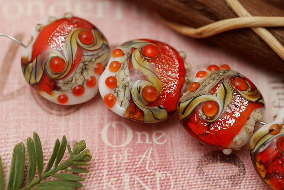 10705612 - Four Fire Red Stardust Lentil Beads