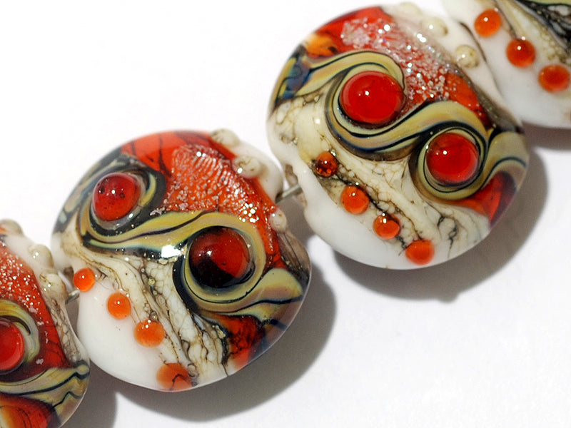 10705612 - Four Fire Red Stardust Lentil Beads