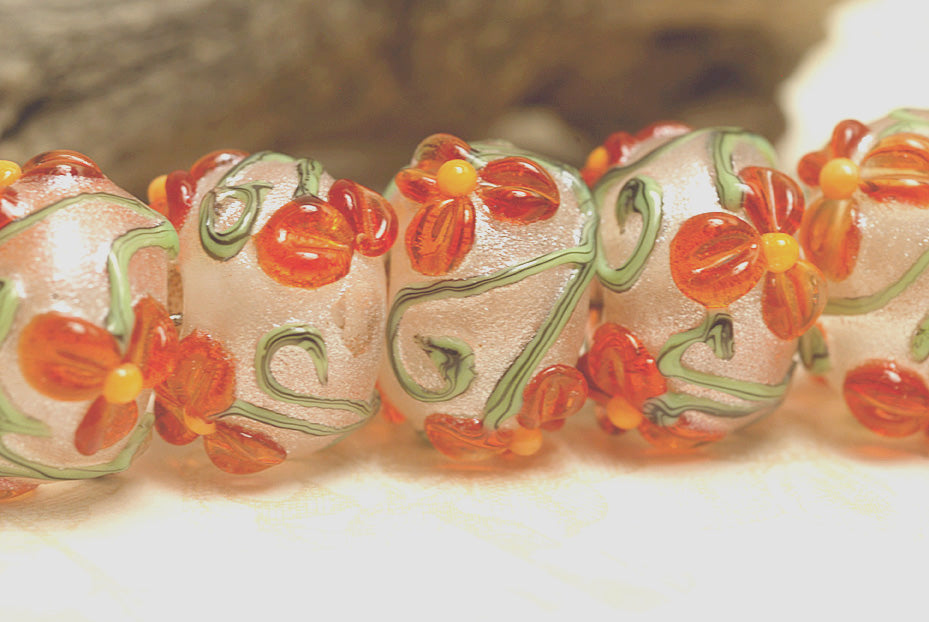 10705901 - Seven Vermilion Flower Rondelle Beads