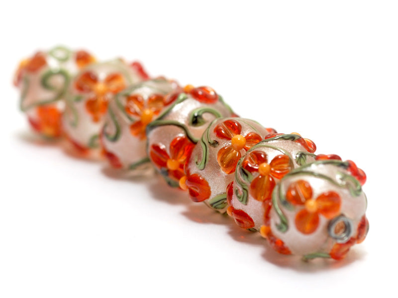 10705901 - Seven Vermilion Flower Rondelle Beads