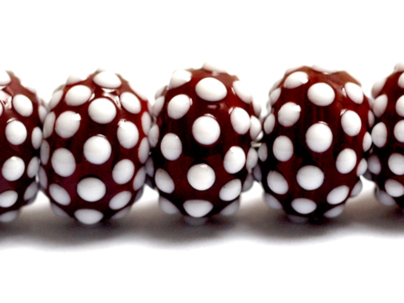 10707101 - Seven Polka Dots on Burgundy Rondelle Beads