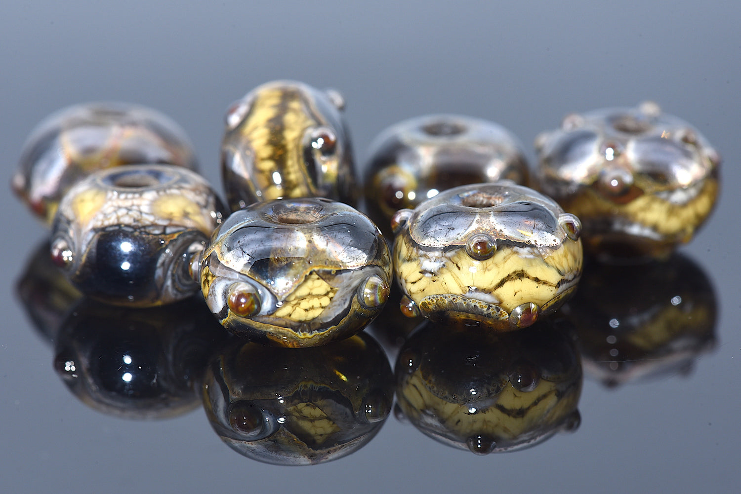 10800801 - Seven Black w/Yellow Silver Foil Rondelle Beads