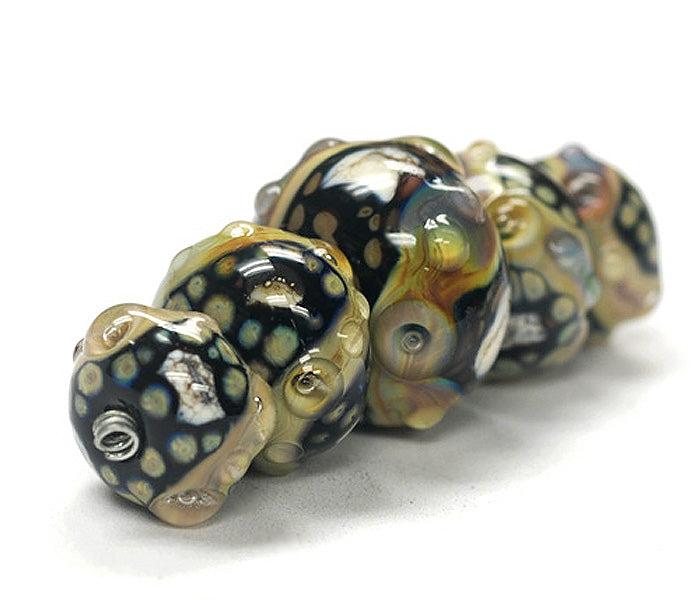 10902311 - Five Graduated Cheyenne Rock Beads
