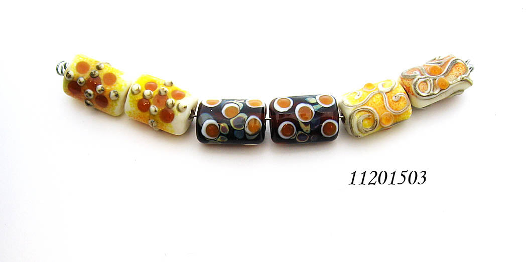 11201503 - Six Dark Yellow w/Silver Stringers Mini Kalera Beads