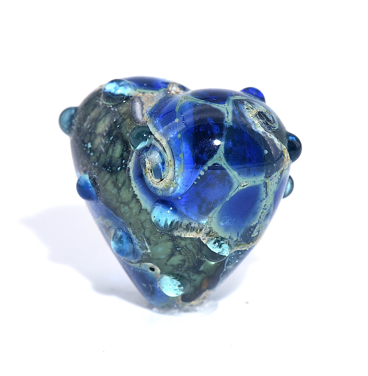 Blue and green glass bead on a white background