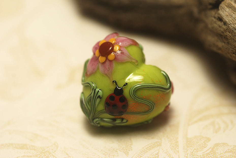 11833105 - Ladybug on Spring Green Heart