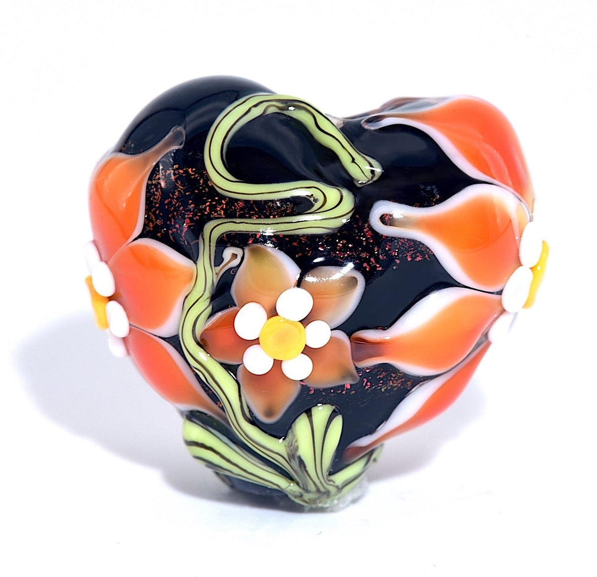 Colorful glass bead with floral design on a white background