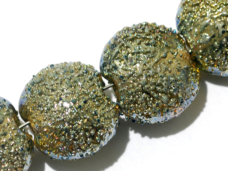 40101002 - Seven Golden Green Metallic Lentil Beads