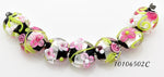 10106502 - Seven Pink/Black/Green Silver Foil Lentil Beads