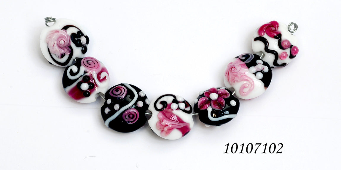 10107102 - Seven Black & White w/Pink Lentil Beads