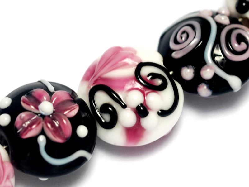10107102 - Seven Black & White w/Pink Lentil Beads