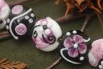 10107102 - Seven Black & White w/Pink Lentil Beads