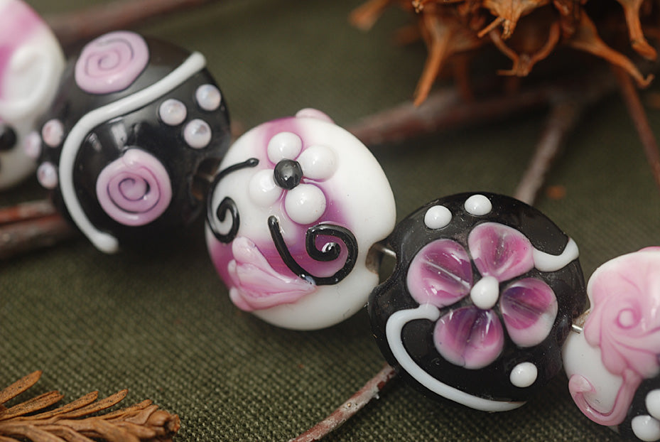 10107102 - Seven Black & White w/Pink Lentil Beads