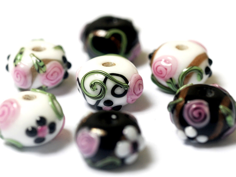 10107501 - Seven Black/White w/Flower & Leaf Rondelle Beads