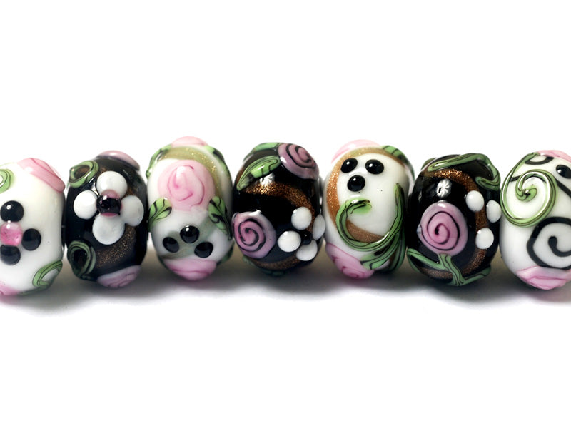 10107501 - Seven Black/White w/Flower & Leaf Rondelle Beads