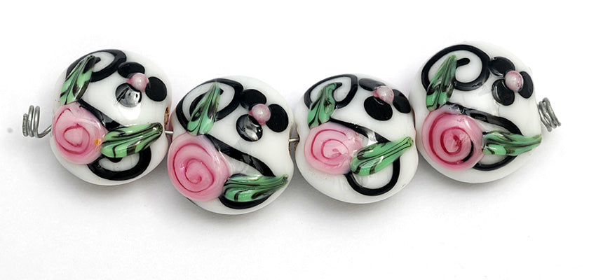 10107512 - Four White w/Black & Pink Flowers Lentil Beads