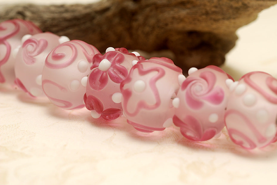 10108501 - Seven Pink/White Frosted Rondelle Beads