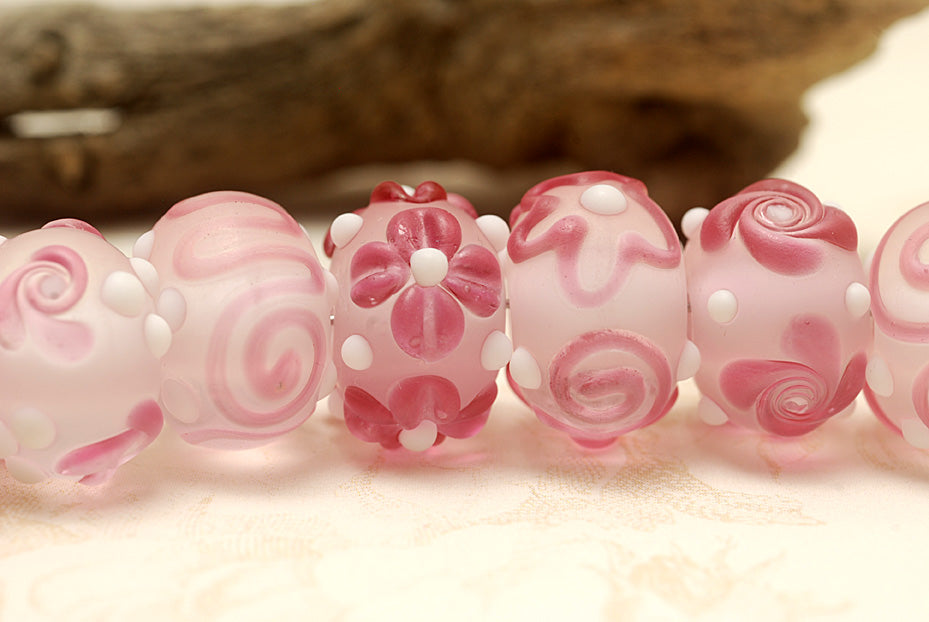 10108501 - Seven Pink/White Frosted Rondelle Beads